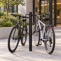 Svart cykelpollare som cykelställ utanför kontor