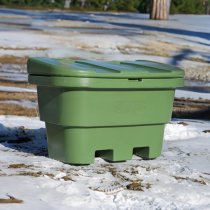 Grön gatusandlåda vid vägen