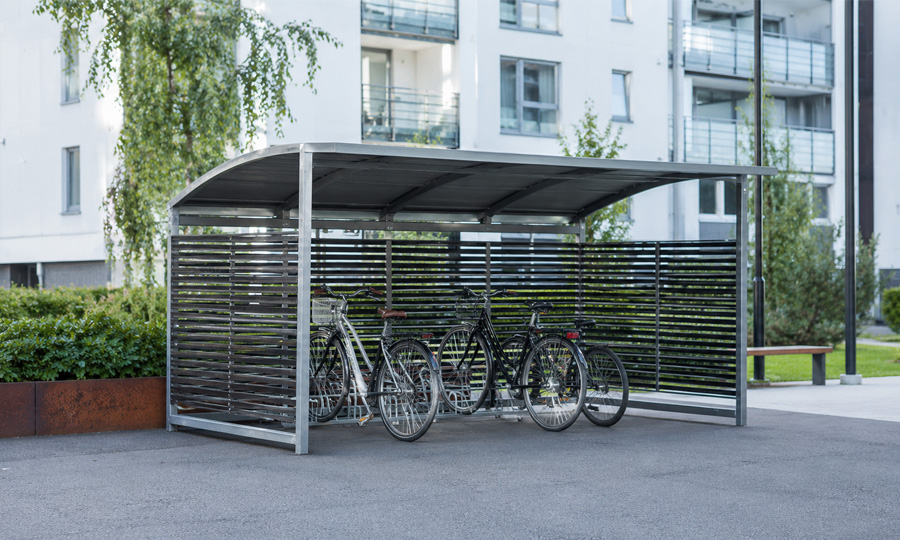 Cykelgarage, cykelhus och cykelparkeringar utomhus Cykelgarage, cykelhus och cykelförråd utomhus